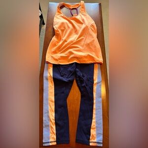 Ellie Orange and Blue workout top & leggings. Women’s size medium.